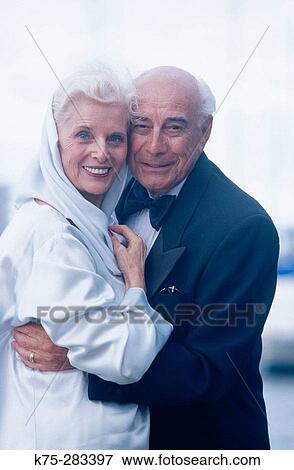 Seniors hugging View Large Photo Image Stock Photo - Seniors hugging. Fotosearch