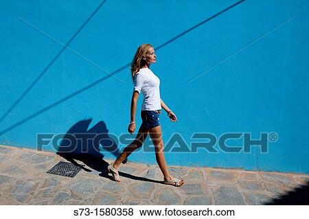 Stock Photo - Sensual woman in Juzcar, in the Serrania of Ronda. MBlaga province. Fotosearch