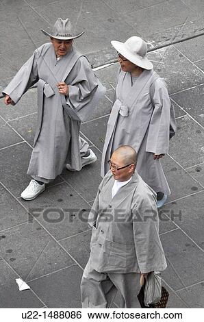 Seoul (South Korea): Buddhist monks walking in Insadong View Large Photo Image Stock Photograph - Seoul (South Korea): Buddhist monks walking in Insadong. Fotosearch