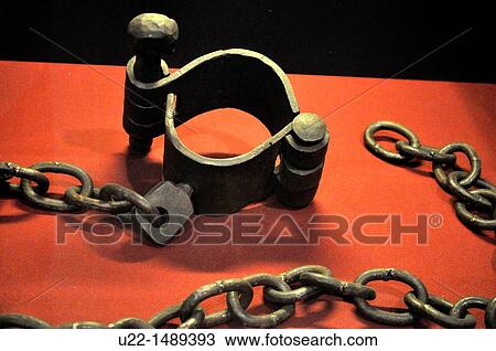 Stock Image - Seoul (South Korea): chains for prisoners at the Seodaemun Prison History Hall. Fotosearch