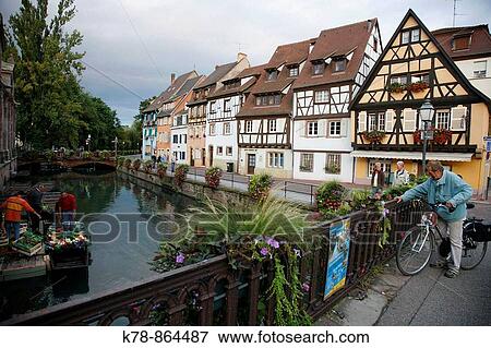Sep 2008 - Water canal and colorful half timbered houses on quai de la Poissonnerie street in Petite Venise, Colmar, Alsace, France View Large Photo Image Stock Photo - Sep 2008 - Water canal and colorful half timbered houses on quai de la Poissonnerie street in Petite Venise, Colmar, Alsace, France. Fotosearch