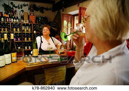 Sep 2008 - Wine tasting, Riquewihr, Alsace, France View Large Photo Image Stock Image - Sep 2008 - Wine tasting, Riquewihr, Alsace, France. Fotosearch