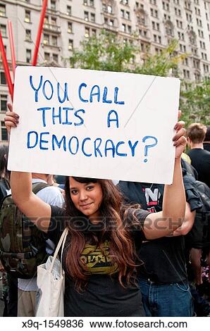 September 30, 2011, Downtown Manhattan, Wall Street financial area vicinity, Occupy Wall Street is an ongoing series of demonstrations in New York City, protesting against social and economic inequality View Large Photo Image Stock Photograph - September 30, 2011, Downtown Manhattan, Wall Street financial area vicinity, Occupy Wall Street is an ongoing series of demonstrations in New York City, protesting against social and economic inequality. Fotosearch