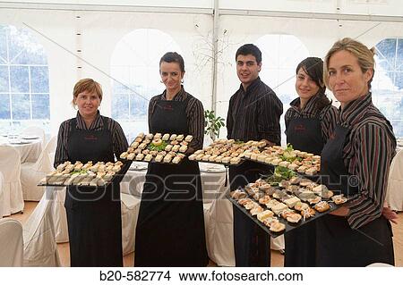 Serving canap? s. Tent for a wedding celebration. Divinus Catering, San Sebastian, Donostia, Gipuzkoa, Euskadi. Spain. View Large Photo Image Picture - Serving canap? s. Tent for a wedding celebration. Divinus Catering, San Sebastian, Donostia, Gipuzkoa, Euskadi. Spain.. Fotosearch
