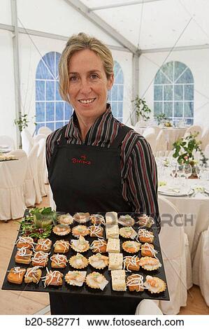 Serving canap? s. Tent for a wedding celebration. Divinus Catering, San Sebastian, Donostia, Gipuzkoa, Euskadi. Spain. View Large Photo Image Stock Image - Serving canap? s. Tent for a wedding celebration. Divinus Catering, San Sebastian, Donostia, Gipuzkoa, Euskadi. Spain.. Fotosearch