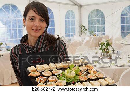 Serving canap? s. Tent for a wedding celebration. Divinus Catering, San Sebastian, Donostia, Gipuzkoa, Euskadi. Spain. View Large Photo Image Stock Image - Serving canap? s. Tent for a wedding celebration. Divinus Catering, San Sebastian, Donostia, Gipuzkoa, Euskadi. Spain.. Fotosearch