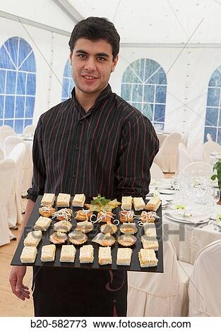 Serving canap? s. Tent for a wedding celebration. Divinus Catering, San Sebastian, Donostia, Gipuzkoa, Euskadi. Spain. View Large Photo Image Stock Image - Serving canap? s. Tent for a wedding celebration. Divinus Catering, San Sebastian, Donostia, Gipuzkoa, Euskadi. Spain.. Fotosearch