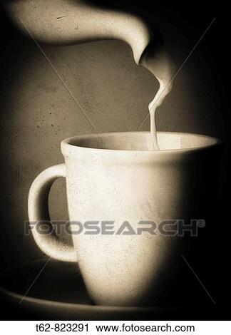 Serving milk in the cup View Large Photo Image Stock Image - Serving milk in the cup. Fotosearch