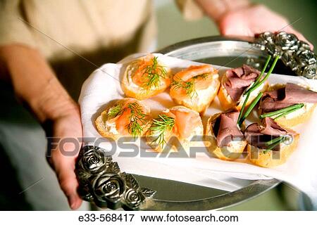 Serving platter with mixed appetizers - smoked salmon and beef tenderloin. View Large Photo Image Stock Photo - Serving platter with mixed appetizers - smoked salmon and beef tenderloin.. Fotosearch