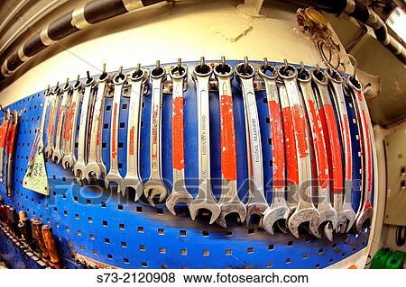 Set of the working tool at the stand in a container transport View Large Photo Image Stock Photo - Set of the working tool at the stand in a container transport. Fotosearch