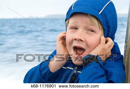 seven year old boy on boat trip from Flores Island to Tofino, West Coast, Vancouver Island, British Columbia, Canada View Large Photo Image Stock Image - seven year old boy on boat trip from Flores Island to Tofino, West Coast, Vancouver Island, British Columbia, Canada. Fotosearch
