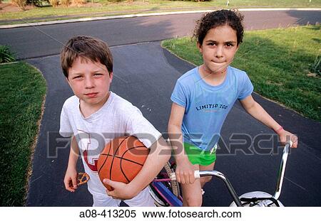 Seven year old girl and boy. USA. View Large Photo Image Stock Photography - Seven year old girl and boy. USA.. Fotosearch