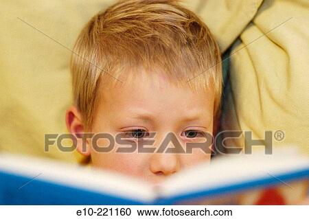 Seven-years-old boy reading View Large Photo Image Stock Image - Seven-years-old boy reading. Fotosearch