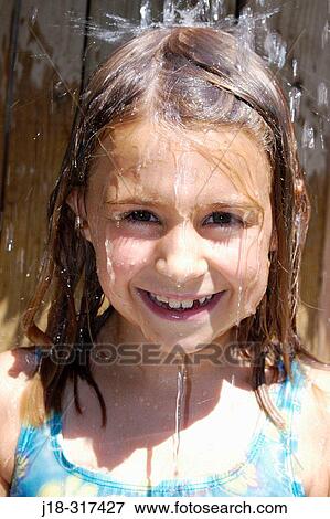 Seven years old girl at water park View Large Photo Image Stock Photo - Seven years old girl at water park. Fotosearch