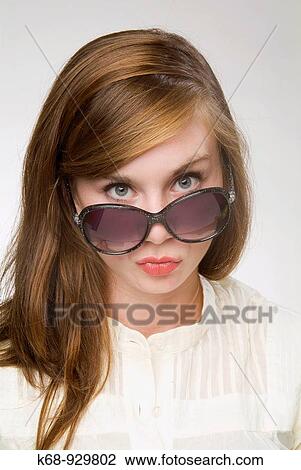seventeen year old girl in studio portrait, wearing sunglasses View Large Photo Image Stock Image - seventeen year old girl in studio portrait, wearing sunglasses. Fotosearch