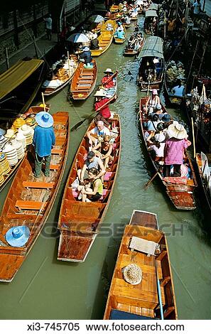 Several boats, Damnoen Saduak floating market, Ratchaburi Province, near Bangkok, Thailand View Large Photo Image Stock Photography - Several boats, Damnoen Saduak floating market, Ratchaburi Province, near Bangkok, Thailand. Fotosearch