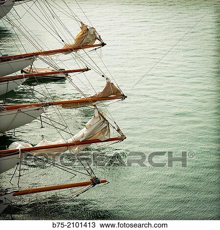 Several bowsprit of a classic sailboat moored at the Port Mahon, Menorca, Balearic Islands, Spain. View Large Photo Image Stock Image - Several bowsprit of a classic sailboat moored at the Port Mahon, Menorca, Balearic Islands, Spain.. Fotosearch