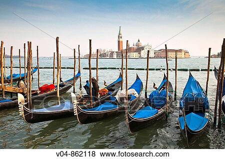 Several gondolas moored in front of San Giorgio Maggiore in Venice, Italy, Europe View Large Photo Image Stock Photo - Several gondolas moored in front of San Giorgio Maggiore in Venice, Italy, Europe. Fotosearch