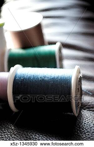 Several rolls of different colored thread with effects View Large Photo Image Stock Image - Several rolls of different colored thread with effects. Fotosearch