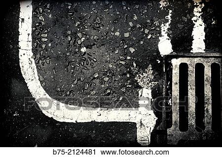 sewer and road markings painted on the asphalt road in London, England, UK, Europe. View Large Photo Image Stock Image - sewer and road markings painted on the asphalt road in London, England, UK, Europe.. Fotosearch