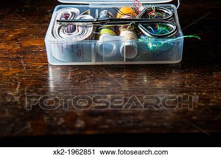sewing box kit on rustic wood View Large Photo Image Stock Image - sewing box kit on rustic wood. Fotosearch