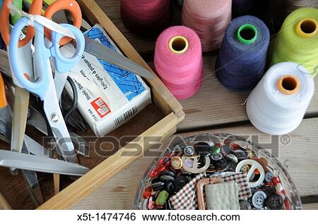 Sewing kit with scissors, yarn, pins and needles View Large Photo Image Stock Photograph - Sewing kit with scissors, yarn, pins and needles. Fotosearch