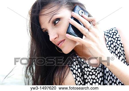 Sexy 25 year old pretty woman outdoors talking by cell phone View Large Photo Image Stock Image - Sexy 25 year old pretty woman outdoors talking by cell phone. Fotosearch