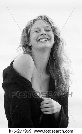 Stock Photo - sexy blonde in black sweater. Fotosearch