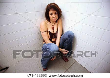 Sexy caucassian woman sitting in corner View Large Photo Image Stock Image - Sexy caucassian woman sitting in corner. Fotosearch