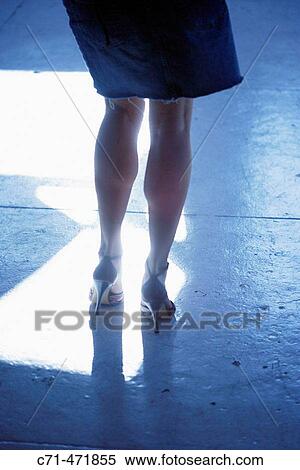 Sexy legs in highlight View Large Photo Image Stock Photography - Sexy legs in highlight. Fotosearch