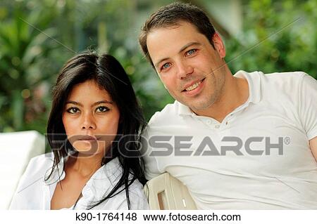 Sexy young woman and handsome caucasian man, Indonesia, Asia View Large Photo Image Stock Photo - Sexy young woman and handsome caucasian man, Indonesia, Asia. Fotosearch