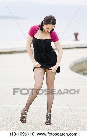 Stock Image - Sexy young woman provocation. Fotosearch