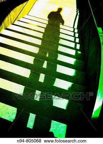 Shadow Creek of self projected onto the staircase descent. View Large Photo Image Stock Photo - Shadow Creek of self projected onto the staircase descent.. Fotosearch