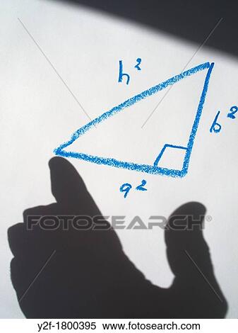 shadow hand measuring Pythagorean triangle drawn in blue crayon View Large Photo Image Stock Photography - shadow hand measuring Pythagorean triangle drawn in blue crayon. Fotosearch