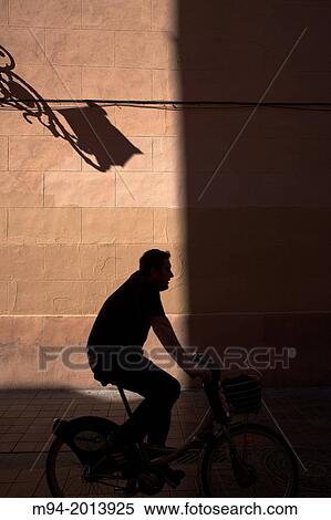 shadow of a man in a bycicle. View Large Photo Image Stock Photography - shadow of a man in a bycicle.. Fotosearch