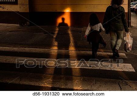 shadow of a person and pedestrians, Valencia, Spain View Large Photo Image Stock Image - shadow of a person and pedestrians, Valencia, Spain. Fotosearch