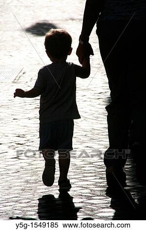 shadow of mum and child on cobbles View Large Photo Image Stock Photography - shadow of mum and child on cobbles. Fotosearch