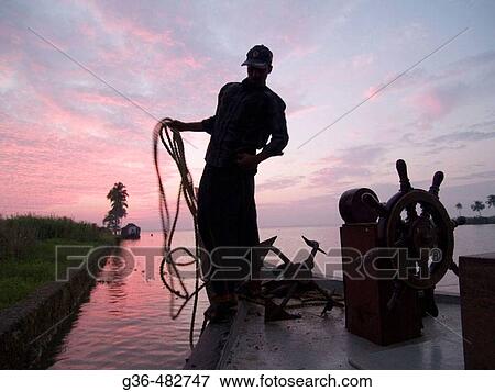 Shadows and silhouettes of people in Sri Lanka View Large Photo Image Stock Photo - Shadows and silhouettes of people in Sri Lanka. Fotosearch