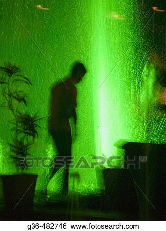 Stock Photograph - Shadows and silhouettes of people in Sri Lanka. Fotosearch