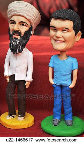 Shanghai (China): handmade statuettes of Osama Bin Laden and Yao Ming sold at the Yuyuan Bazaar, in the Old Town View Large Photo Image Stock Photo - Shanghai (China): handmade statuettes of Osama Bin Laden and Yao Ming sold at the Yuyuan Bazaar, in the Old Town. Fotosearch