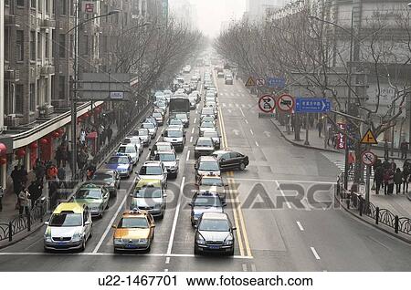 Shanghai (China): urban traffic along Huai Hai Road View Large Photo Image Stock Image - Shanghai (China): urban traffic along Huai Hai Road. Fotosearch