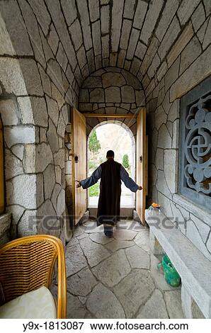 Shaolin Monk Shi De Jian and the San Huang Zhai Monastery on the Song Mountain, China View Large Photo Image Stock Photo - Shaolin Monk Shi De Jian and the San Huang Zhai Monastery on the Song Mountain, China. Fotosearch