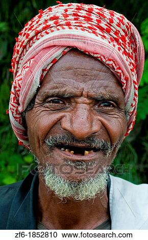 Shashemene Ethiopia Africa Alaba tribe portrait of local old man with red turban farmer and smile 9 View Large Photo Image Stock Image - Shashemene Ethiopia Africa Alaba tribe portrait of local old man with red turban farmer and smile 9. Fotosearch