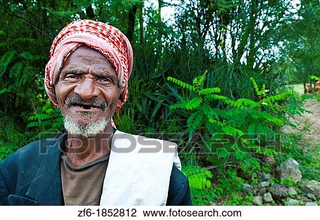 Shashemene Ethiopia Africa Alaba tribe portrait of local old man with red turban farmer and smile 9 View Large Photo Image Stock Image - Shashemene Ethiopia Africa Alaba tribe portrait of local old man with red turban farmer and smile 9. Fotosearch