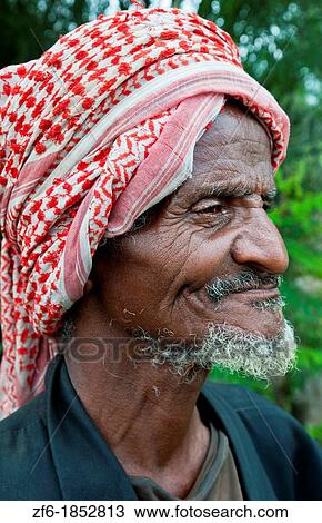 Shashemene Ethiopia Africa Alaba tribe portrait of local old man with red turban farmer and smile 9 View Large Photo Image Stock Image - Shashemene Ethiopia Africa Alaba tribe portrait of local old man with red turban farmer and smile 9. Fotosearch