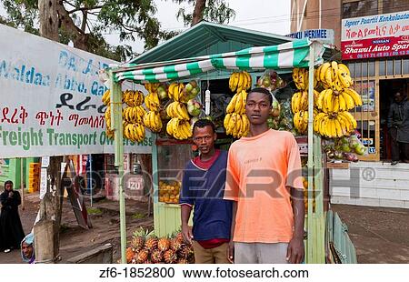 Shashemene Ethiopia Africa boys selling fruit Oromo tribe colorful bananas store for sale fruit 8 View Large Photo Image Stock Image - Shashemene Ethiopia Africa boys selling fruit Oromo tribe colorful bananas store for sale fruit 8. Fotosearch