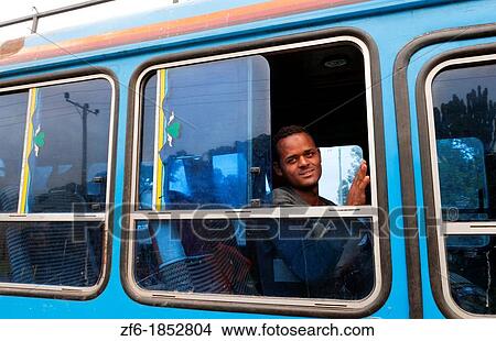 Shashemene Ethiopia Africa Oromo tribe young man on blue bus in window 8 View Large Photo Image Picture - Shashemene Ethiopia Africa Oromo tribe young man on blue bus in window 8. Fotosearch