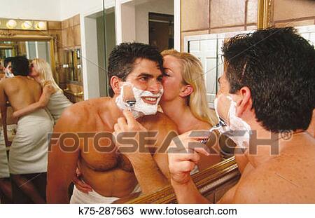 she kisses him while he's shaving View Large Photo Image Stock Image - she kisses him while he's shaving. Fotosearch