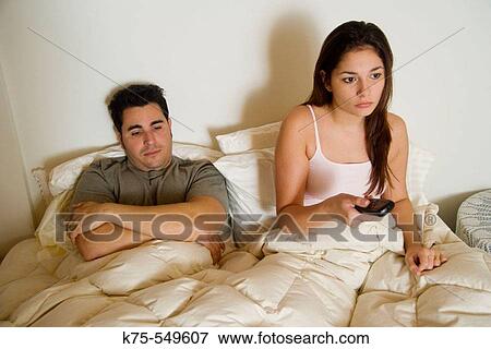 she's got the remote View Large Photo Image Stock Photo - she's got the remote. Fotosearch