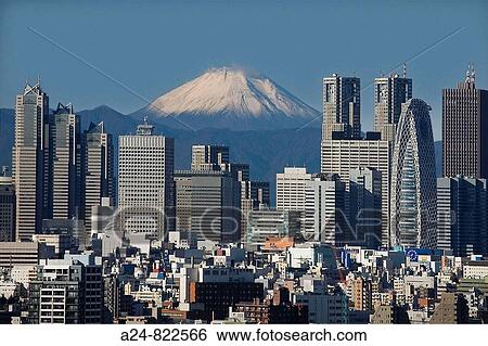 Stock Photograph - Shinjuku district skyline and Mount Fuji in background, Tokyo City, Japan (November 2008). Fotosearch